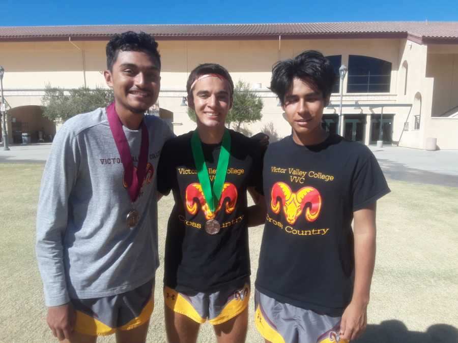 Cross country team after conference championships. From left to right: Julian Gonzales, Eric Perez, Anthony Otero